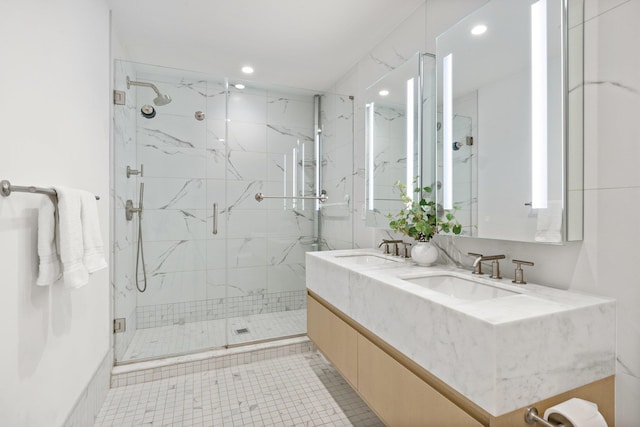 720 Clinton St Unit 6-03, Hoboken, NJ 07030 - bathroom featuring recessed lighting, a marble finish shower, double vanity, and tile patterned flooring