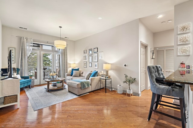 living room with hardwood / wood-style floors