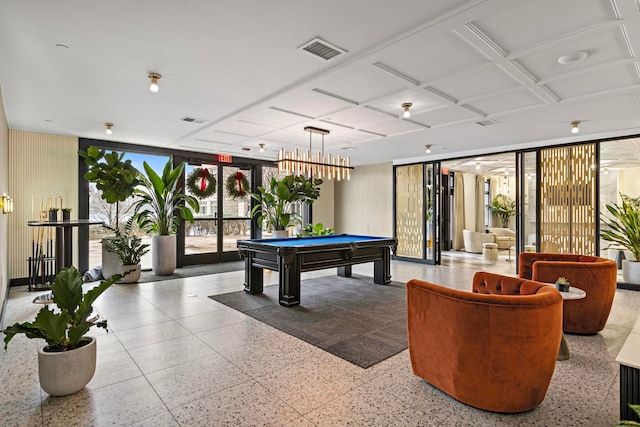 playroom with a wall of windows and pool table