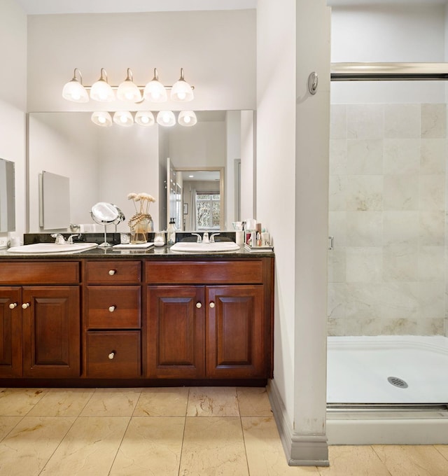 bathroom featuring vanity, walk in shower, and tile patterned floors