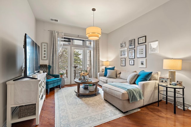 living room with dark wood-type flooring