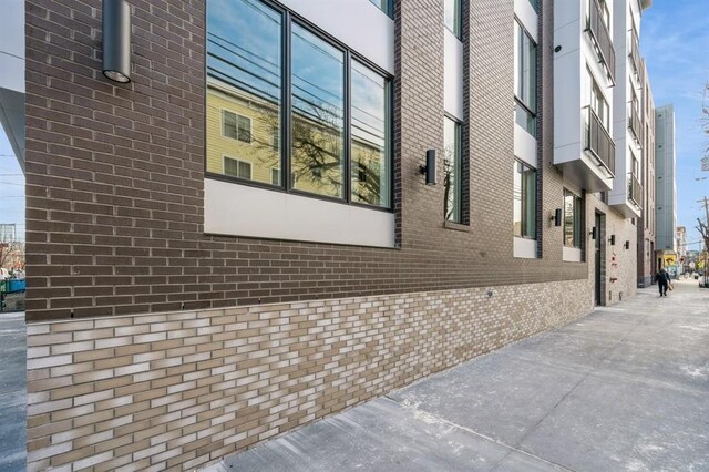 160 Brunswick St Unit 302, Jersey City, NJ 07302 - view of property exterior with brick siding