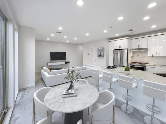 285 Lembeck Ave Unit 1, Jersey City, NJ 07305 - dining room with marble finish floor, visible vents, and recessed lighting