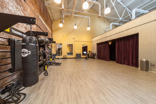 gym with wood finished floors