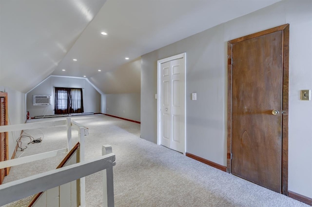 bonus room featuring baseboards, carpet flooring, vaulted ceiling, recessed lighting, and a wall mounted air conditioner