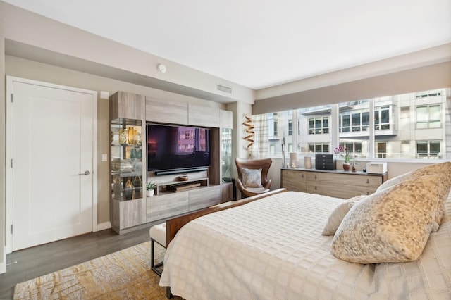 bedroom featuring dark wood-type flooring