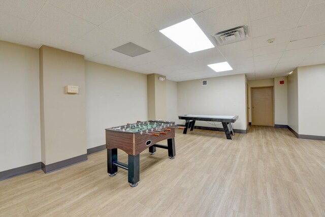 1011 Harmon Cv Unit 1011, Secaucus, NJ 07094 - game room featuring light wood-style floors, baseboards, and a drop ceiling