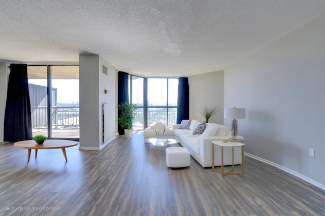 1011 Harmon Cv Unit 1011, Secaucus, NJ 07094 - living room with expansive windows, a textured ceiling, healthy amount of natural light, wood finished floors, and baseboards