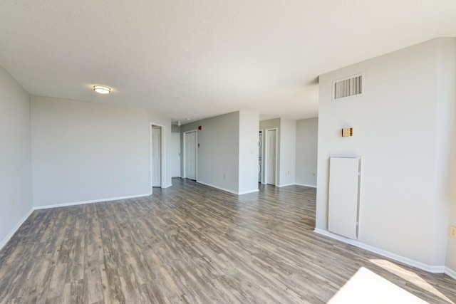 1011 Harmon Cv Unit 1011, Secaucus, NJ 07094 - empty room with wood finished floors and baseboards