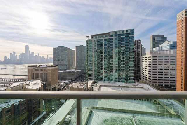 property's view of city featuring a water view