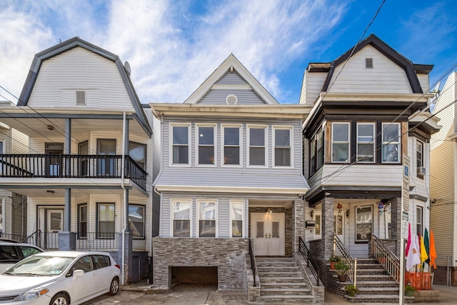 5 Apollo St, Jersey City, NJ 07746 - view of front facade featuring stone siding and a gambrel roof