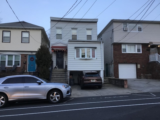 view of front of property featuring a garage