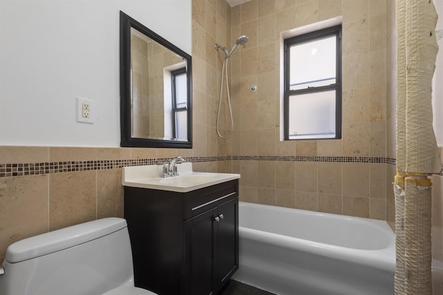 full bath with toilet, tile walls, tub / shower combination, and a wealth of natural light