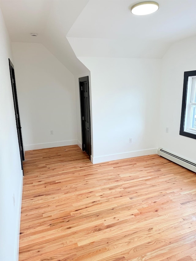 530 45th St, Union City, NJ 07087 - empty room with lofted ceiling and light wood finished floors