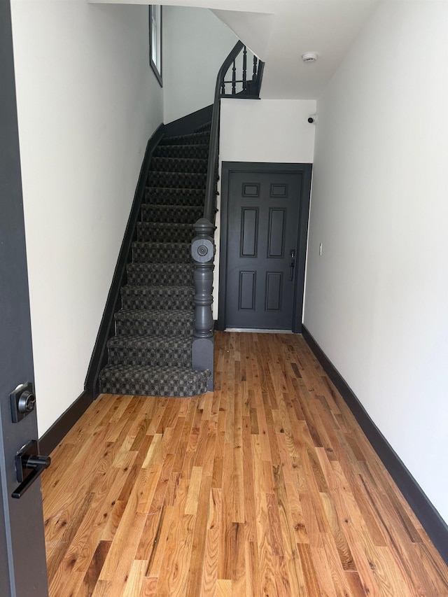 530 45th St, Union City, NJ 07087 - entryway with light wood finished floors and stairway