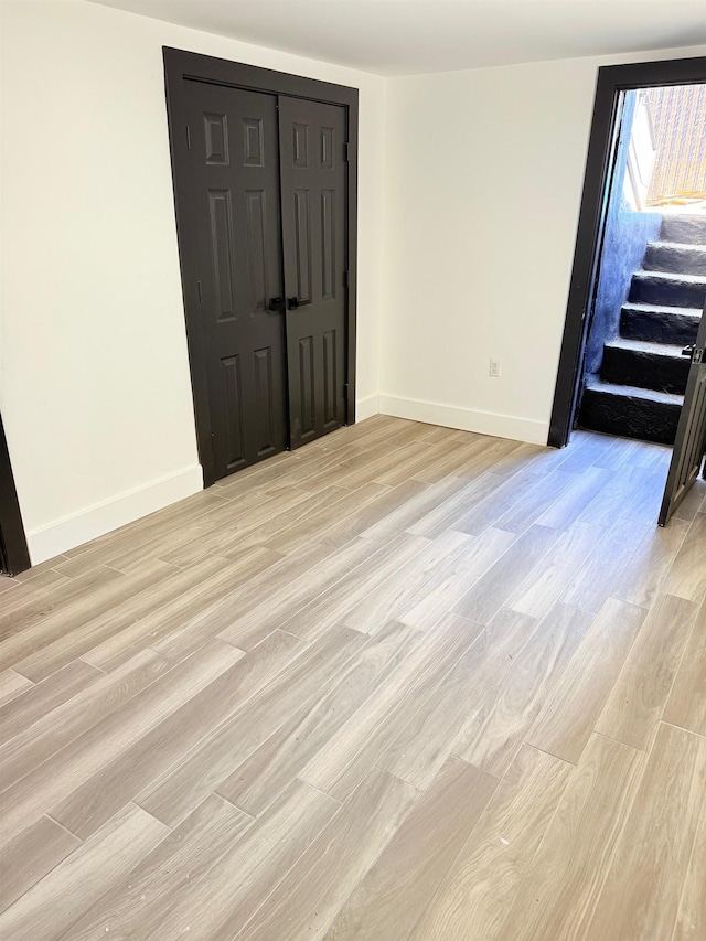530 45th St, Union City, NJ 07087 - unfurnished room featuring stairway and light wood finished floors