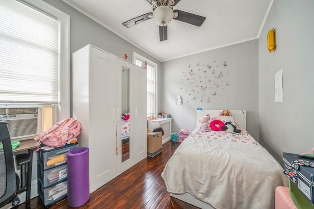 bedroom with ceiling fan, dark wood-type flooring, cooling unit, and crown molding