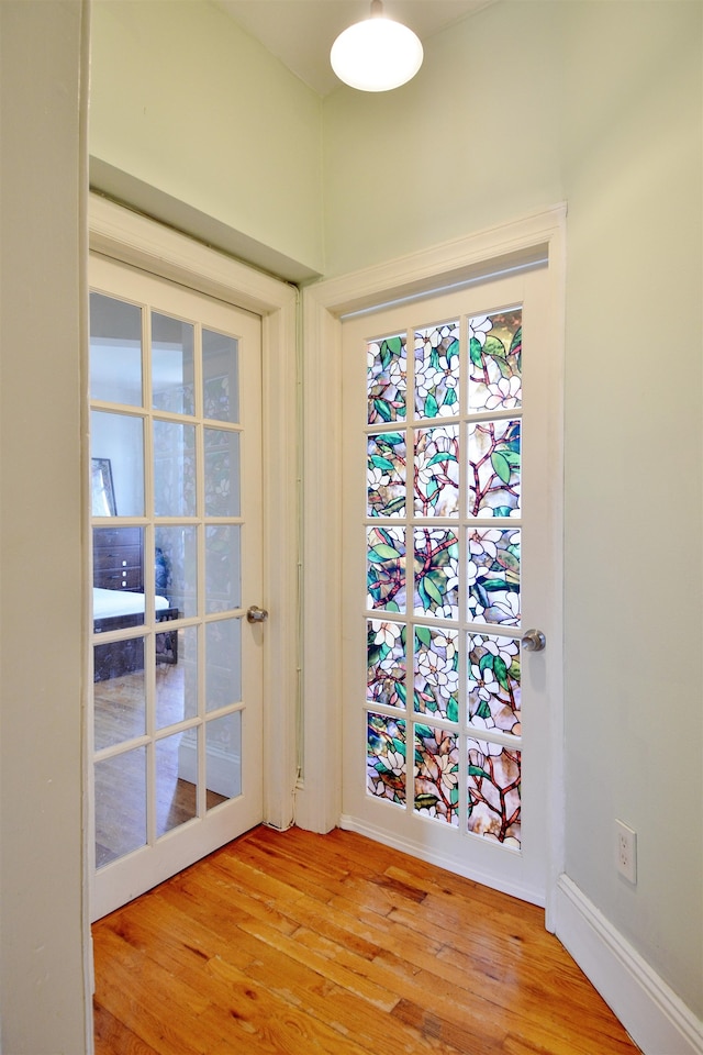 spare room featuring light wood-type flooring