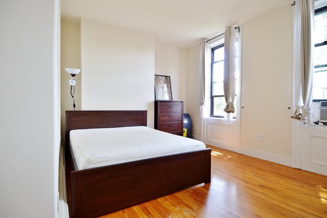 bedroom featuring light hardwood / wood-style flooring