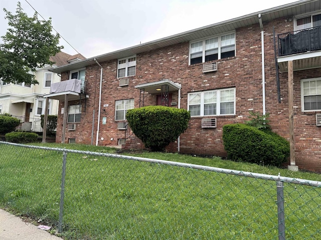 186 Highlands Ave Unit 5A, Clifton, NJ 07011 - view of front of property featuring brick siding and a wall unit AC