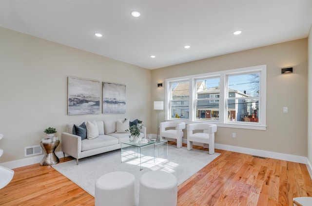 275 Pearsall Ave Unit 2, Jersey City, NJ 07305 - living room featuring baseboards, visible vents, wood finished floors, and recessed lighting