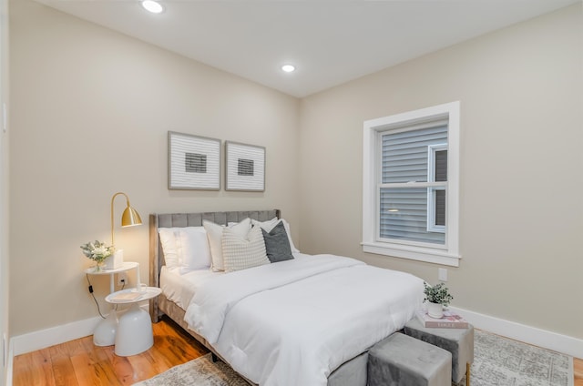 275 Pearsall Ave Unit 2, Jersey City, NJ 07305 - bedroom with recessed lighting, baseboards, and wood finished floors