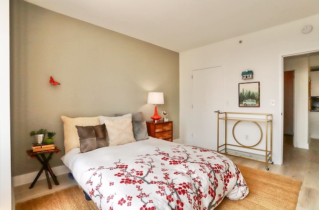 88 Morgan St Unit 2206, Jersey City, NJ 07302 - bedroom with wood finished floors and baseboards