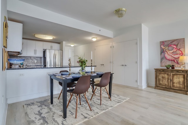 88 Morgan St Unit 2206, Jersey City, NJ 07302 - dining space with light wood-style floors