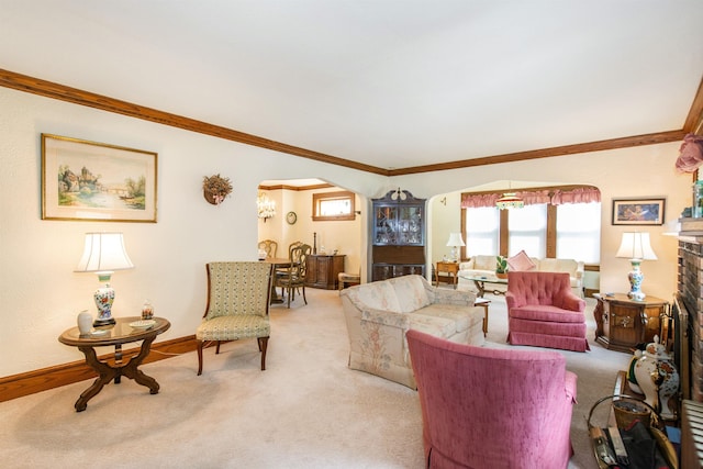 532 Passaic Ave, Nutley, NJ 07110 - living area with light colored carpet, ornamental molding, baseboards, arched walkways, and a brick fireplace