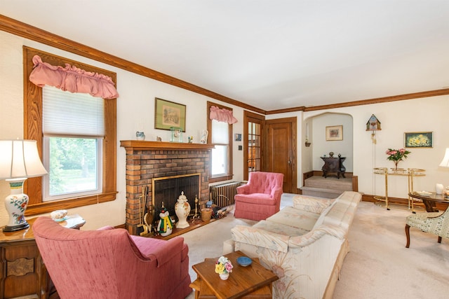 532 Passaic Ave, Nutley, NJ 07110 - living room with carpet flooring, healthy amount of natural light, a brick fireplace, crown molding, and radiator