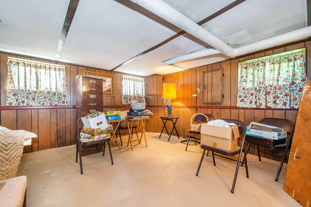 532 Passaic Ave, Nutley, NJ 07110 - sitting room with wood walls and concrete flooring