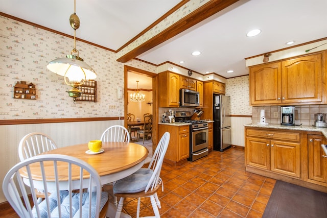 532 Passaic Ave, Nutley, NJ 07110 - kitchen with stainless steel appliances, wallpapered walls, ornamental molding, wainscoting, and a chandelier