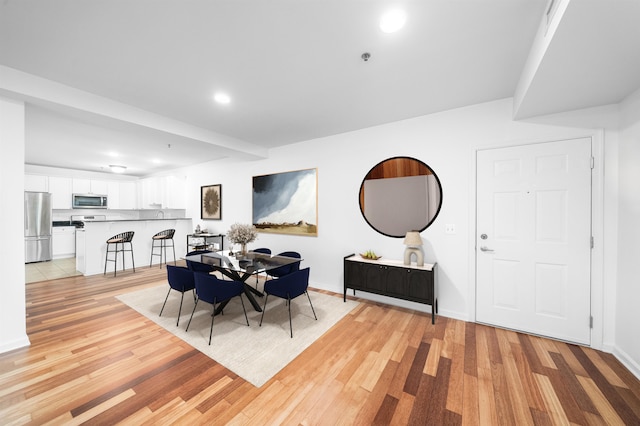 650 2nd St Unit 3C, Hoboken, NJ 07030 - dining room with light wood-style flooring and recessed lighting
