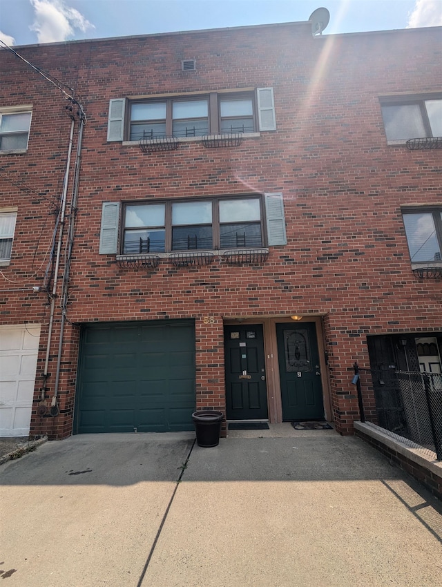 view of property with a garage