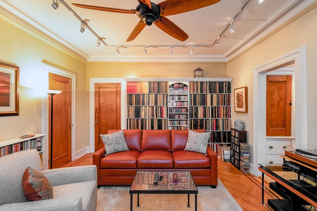 895 Summit Ave, Jersey City, NJ 07307 - living area with track lighting, ornamental molding, and a ceiling fan