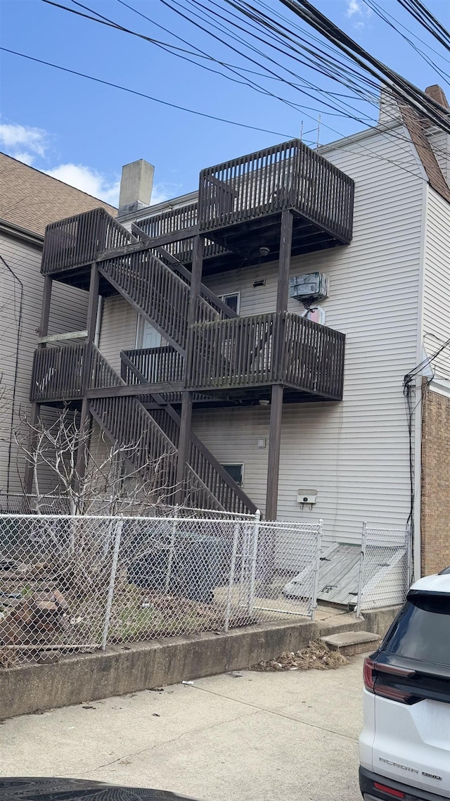 view of home's exterior featuring a balcony