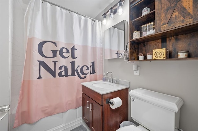 full bath featuring toilet, shower / tub combo, and vanity