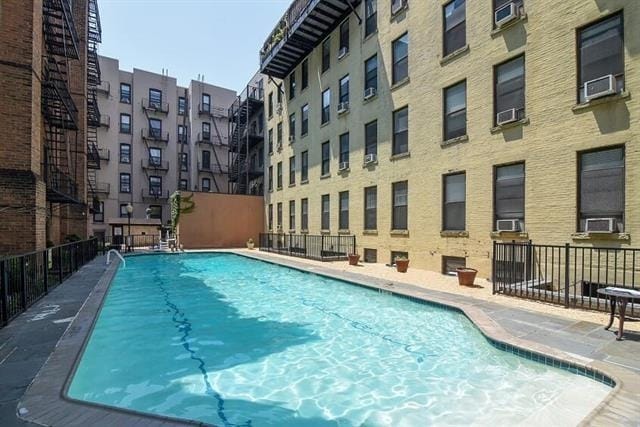 community pool with fence