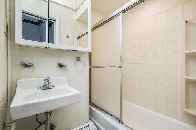 148 S St, Jersey City, NJ 07307 - bathroom with enclosed tub / shower combo and a sink
