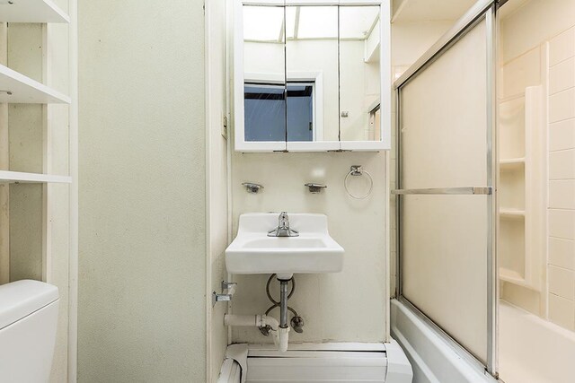 148 S St, Jersey City, NJ 07307 - full bathroom with toilet and enclosed tub / shower combo