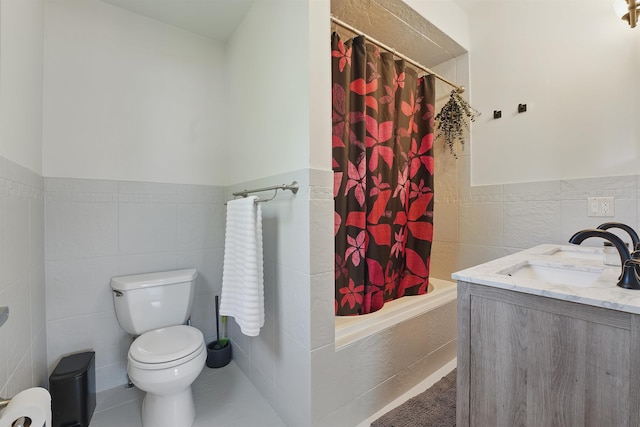 245 Ogden Ave Unit 2, Jersey City, NJ 07307 - full bathroom featuring tile walls, toilet, wainscoting, tiled shower / bath combo, and vanity