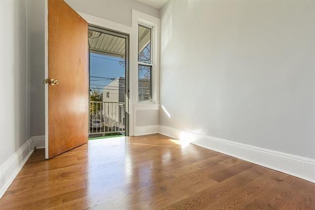 198 Myrtle Ave, Jersey City, NJ 07305 - spare room featuring wood finished floors and baseboards