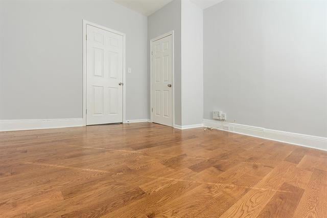 198 Myrtle Ave, Jersey City, NJ 07305 - spare room with wood finished floors