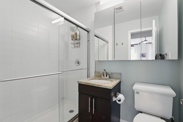 full bath with visible vents, toilet, and a stall shower