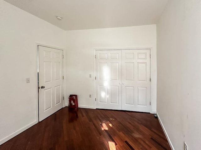 3481 John F Kennedy Blvd Unit 301, Jersey City, NJ 07307 - unfurnished bedroom with dark wood-style floors and a closet