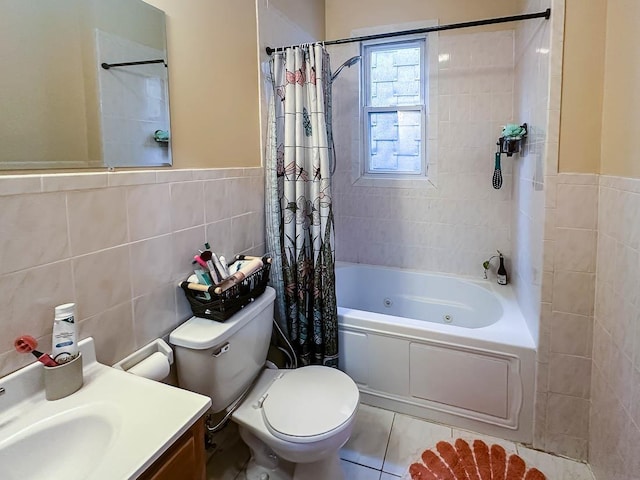 3481 John F Kennedy Blvd Unit 301, Jersey City, NJ 07307 - bathroom with tile walls, a combined bath / shower with jetted tub, vanity, tile patterned flooring, and a wainscoted wall