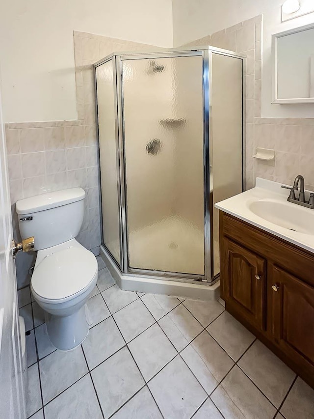 3481 John F Kennedy Blvd Unit 301, Jersey City, NJ 07307 - full bath featuring tile walls, vanity, a stall shower, and tile patterned floors