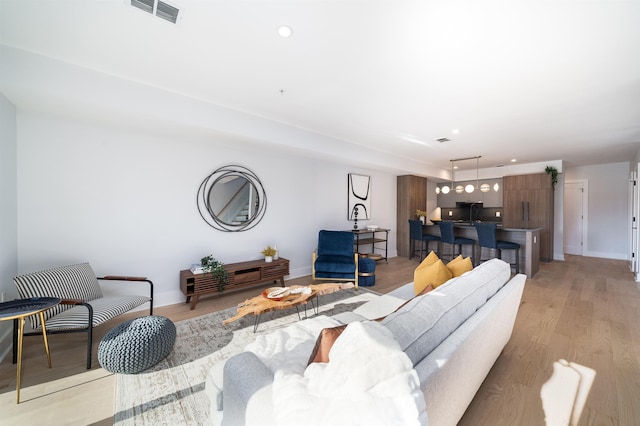 living room featuring light hardwood / wood-style floors