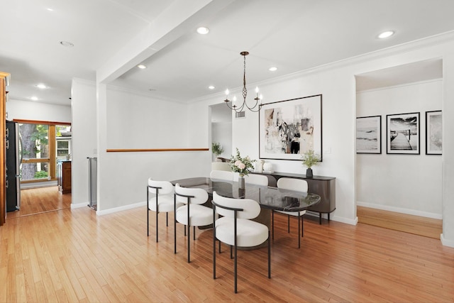 5 Bonn Pl, Weehawken, NJ 07086 - dining space with light wood-style flooring, a chandelier, crown molding, and recessed lighting
