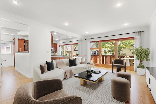 5 Bonn Pl, Weehawken, NJ 07086 - living area featuring ornamental molding, plenty of natural light, light wood-style flooring, and recessed lighting